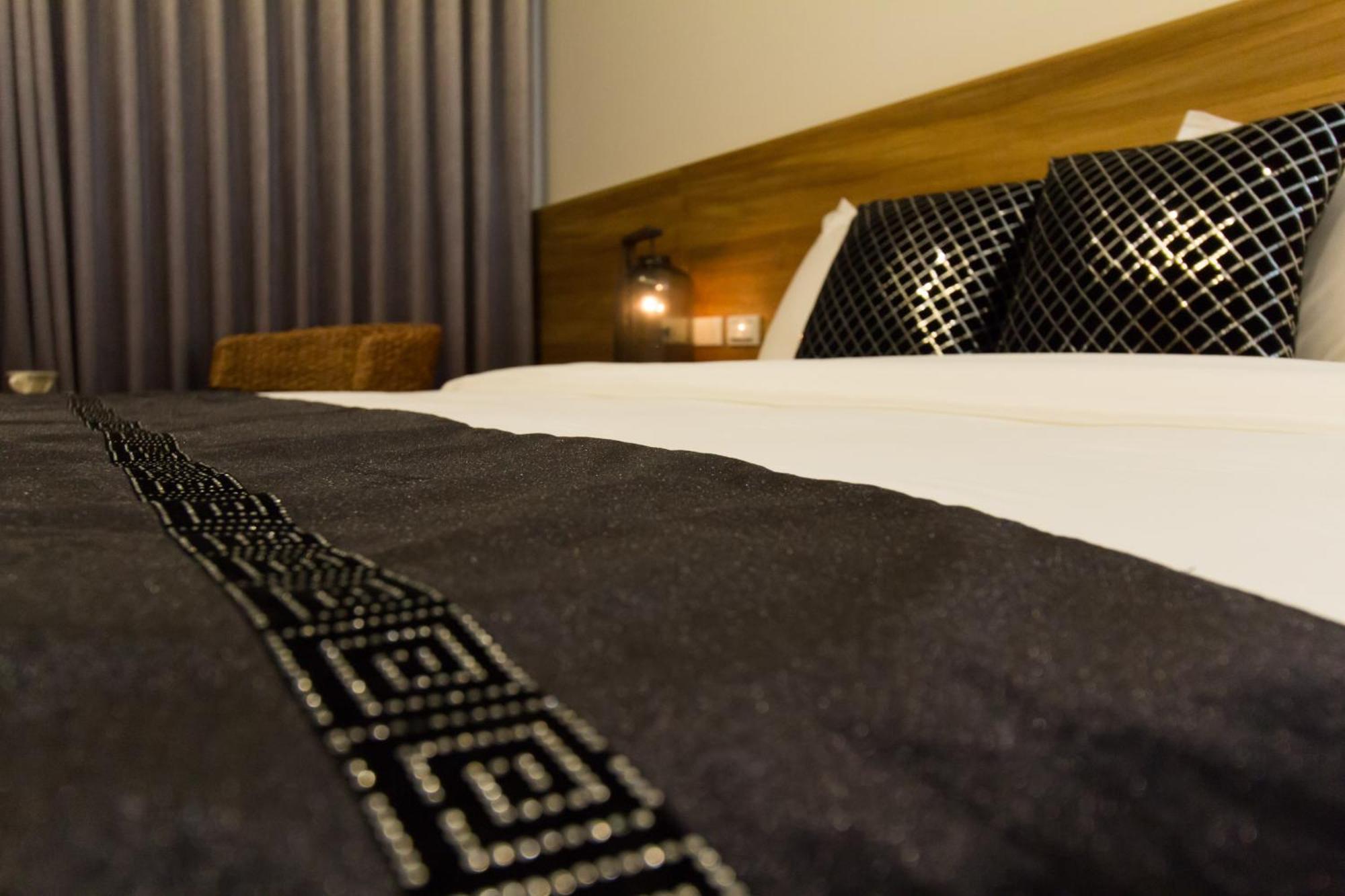 Qi Li Xiang Homestay Vucsie Szoba fotó